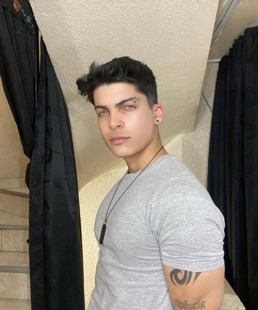 Gaycam stud Charliie Hotx in grey shirt