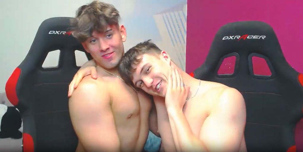 Gay cams models Harper and Gabriel embracing in a hug